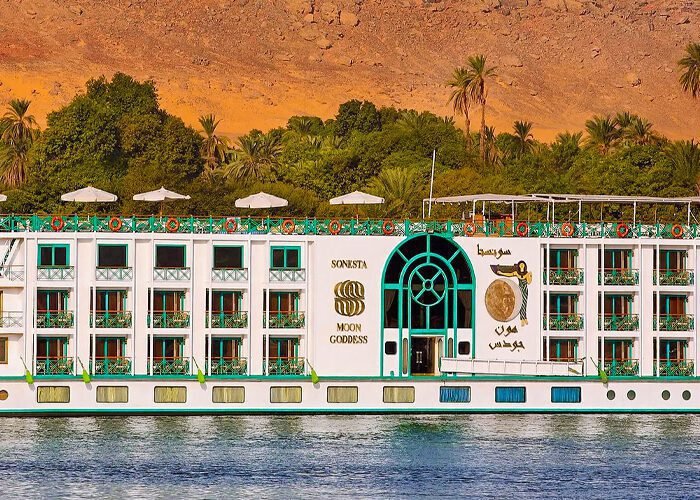 Sonesta Cruises luxury boat sailing on tranquil waters, offering scenic views and memorable travel experiences.