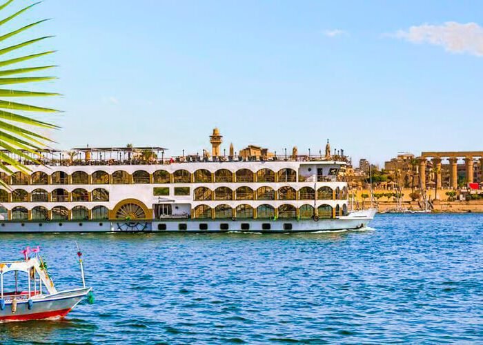 Luxurious cruise experience on the Nile River in Egypt, showcasing scenic views and elegant accommodations.
