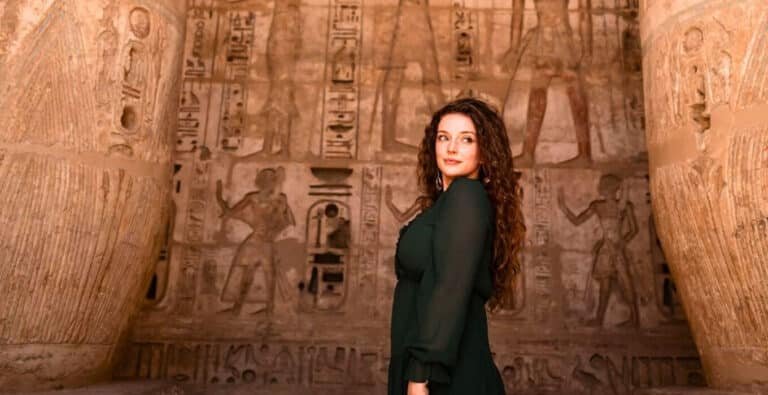 a-wonderful-woman-is-enjoying-her-trip-visiting-amazing-landmarks-and-exploring-the-temples A wonderful woman enjoying her trip, visiting amazing landmarks and exploring temples.