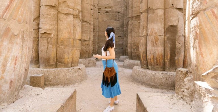 A-wonderful-photo-of-a-girl-from-inside-the-hypostyle-hall-at-Karnak-Temple.