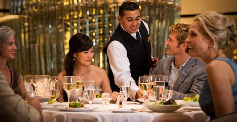 A-wonderful-photo-of-a-group-of-tourists-having-dinner-on-a-cruise-ship.