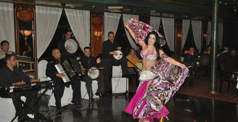 A-wonderful-picture-of-the-belly-dance-show-from-the-entrance-of-the-cruise Belly dancer performs a traditional Egyptian show with a live band on a Nile cruise.
